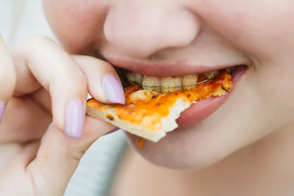 Young girl with braces