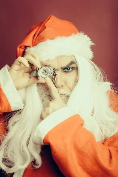 Serious Christmas man with clock on chain — Stock Photo, Image