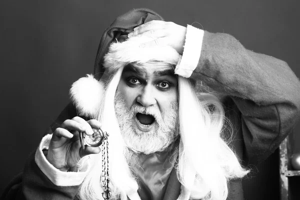 Удивительный рождественский человек с часами на цепи — стоковое фото