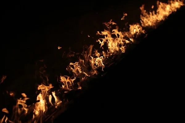 Chama ardente em preto — Fotografia de Stock