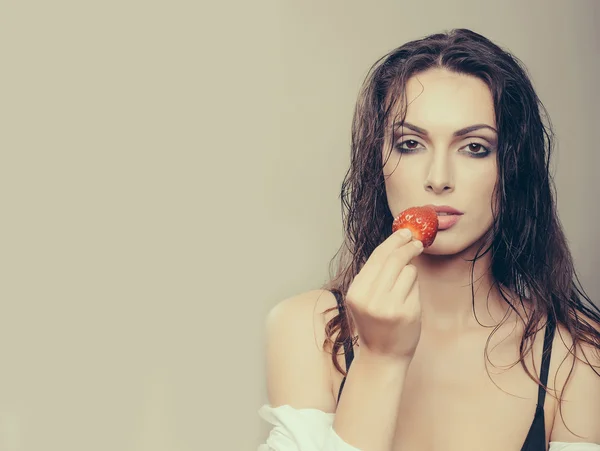 Sexy pretty woman with red strawberry — Stock Photo, Image