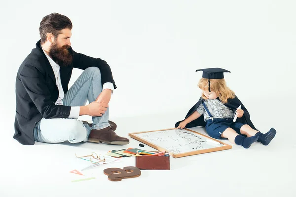 Small boy drawing with professor — Stock Photo, Image