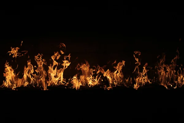 Chama ardente em preto — Fotografia de Stock