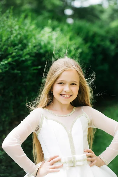 Small girl in white dress outdoor — Stock Photo, Image