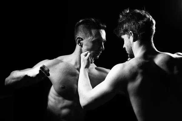 Young muscular men boxing — Stock Photo, Image