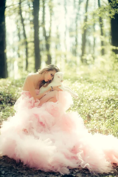 Glamour woman with goat in forest — Stock Photo, Image