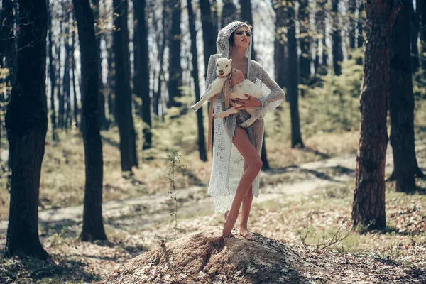 Young woman with goat in forest — Stock Photo, Image