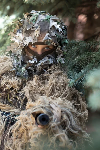 Girl soldier in ghillie camouflage — Stock Photo, Image