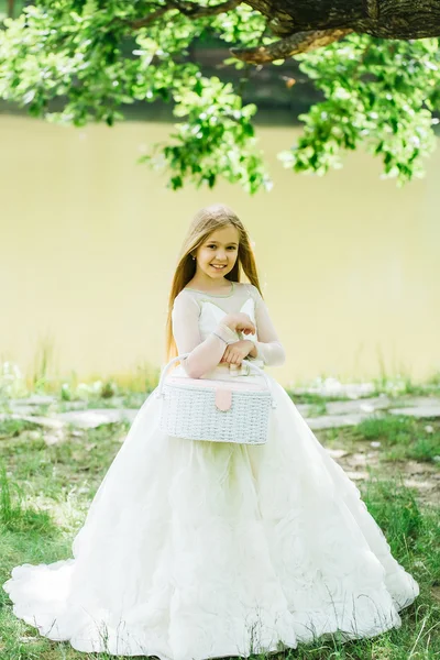 Small girl in white dress outdoor — Stock Photo, Image