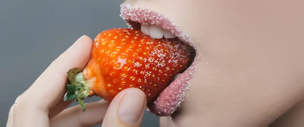 Female sugar lips bite red strawberry — Stock Photo, Image