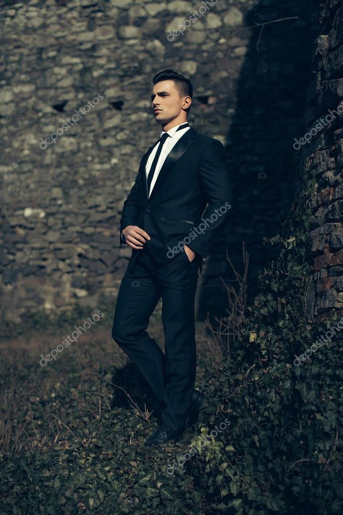 Suit man pose and trendy black white style fashion Stock Photo by shotprime