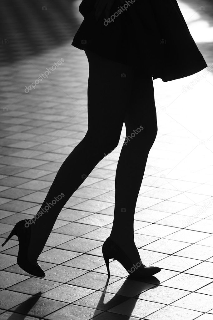 Female legs in glamour shoes