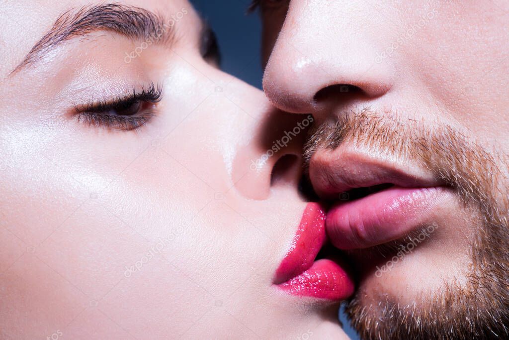 Sensual passionate couple kissing lips. Closeup of couple mouths kiss.