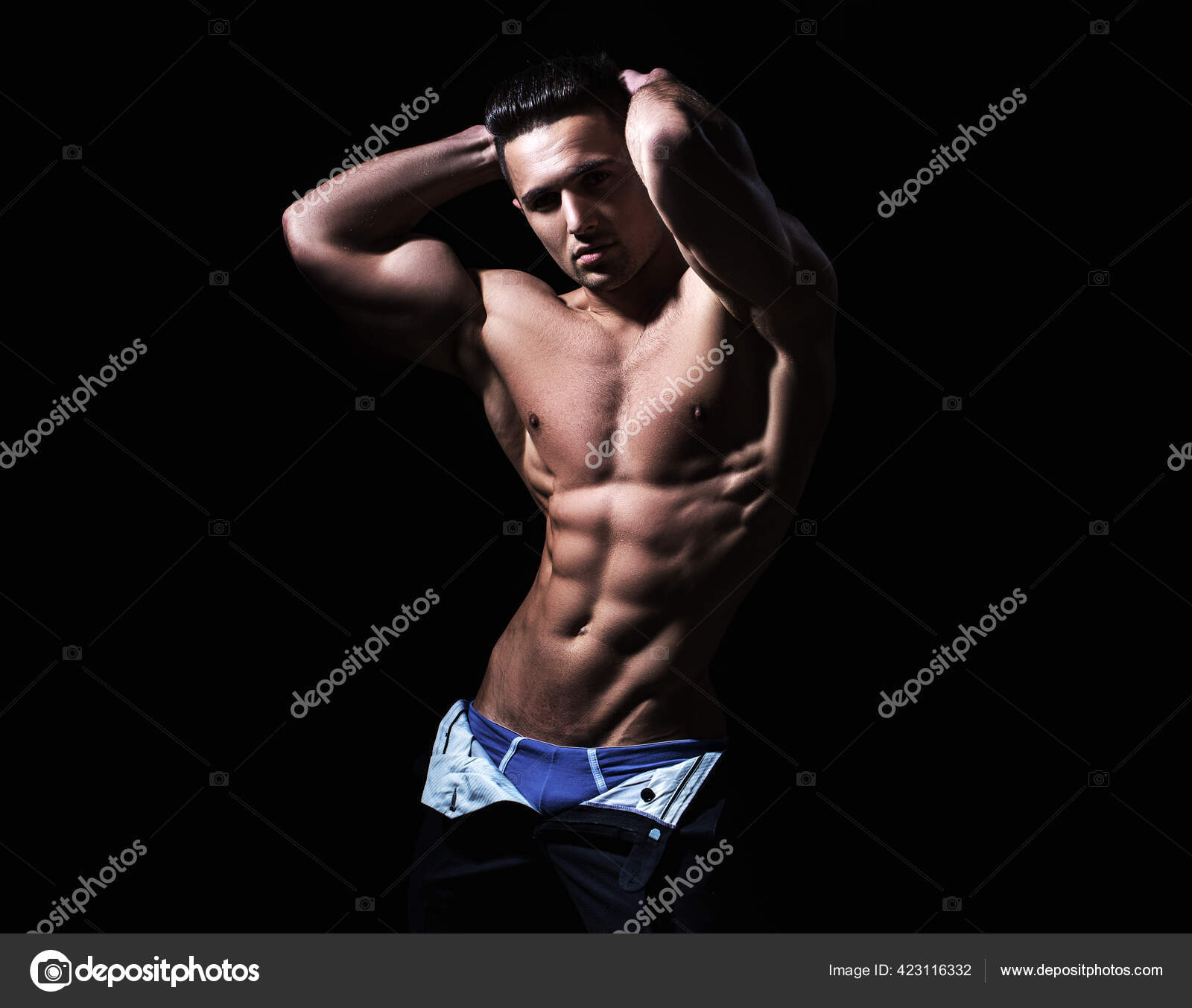 Shirtless athletic naked guy. Athletic young man showing his perfect naked  body. Stock Photo by ©Tverdohlib.com 423116332