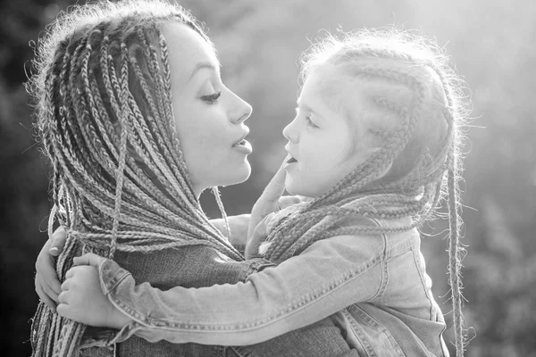Family and motherhood concept. Mother and child girl playing kissing and hugging. Little daughter hugging her happy mother. — Stock Photo, Image