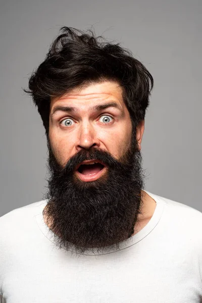 Bearded stylish businessman is surprised. Shocked man with surprise expression, wow amazed excited face. Emotions people concept. — Stock Photo, Image