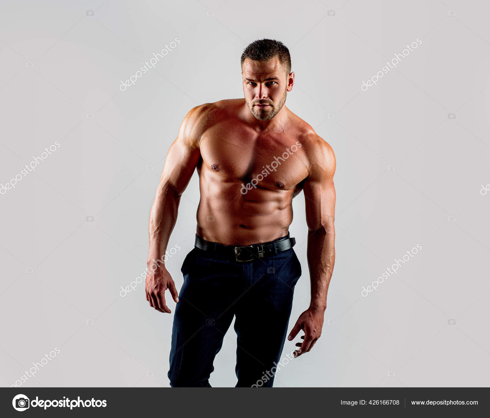 Sexy male bare torso. Fashion portrait of young hot naked guy. Stock