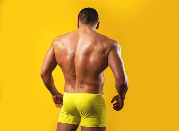 Male buttocks. Muscular back. Strong backside. Mens ass and powerful shoulders. Manliness booty buttocks. Sexy man with muscular body and bare torso. — 스톡 사진