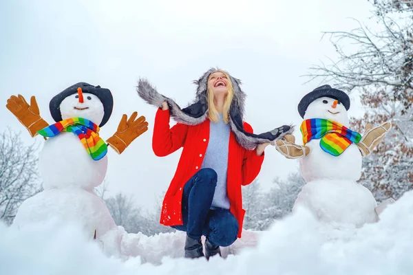 Cute Happy Little Boy and Girl Making Snowman on Christmas Holiday