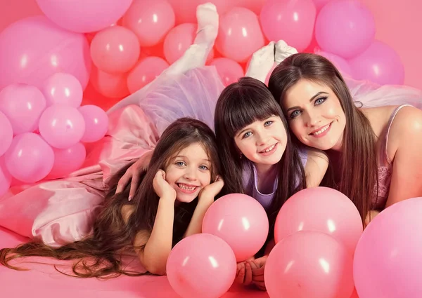 Family, children, mother with party balloons. Birthday, happiness, childhood. Mother and kids in balloons, mothers day. — Stock Photo, Image