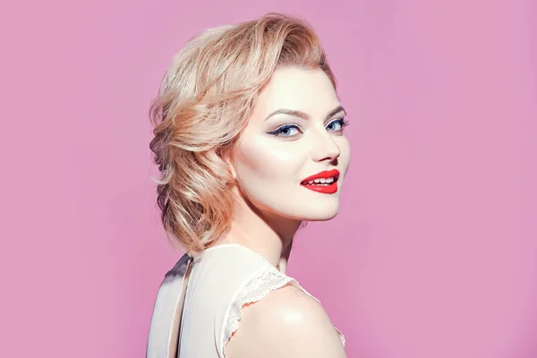 Retro blonde woman with makeup brush, vintage, retro woman on pink background, copy space