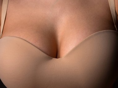 Sexy large breasts. Woman breas, boobs in bra, sensual tits. Beautiful slim female body. Lingerie model. Closeup boob.