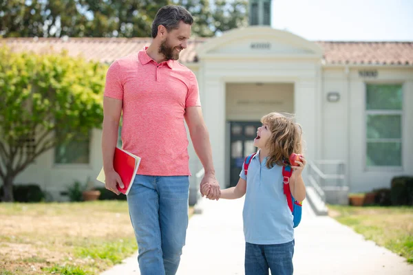 Father and son go to school, education and learning.