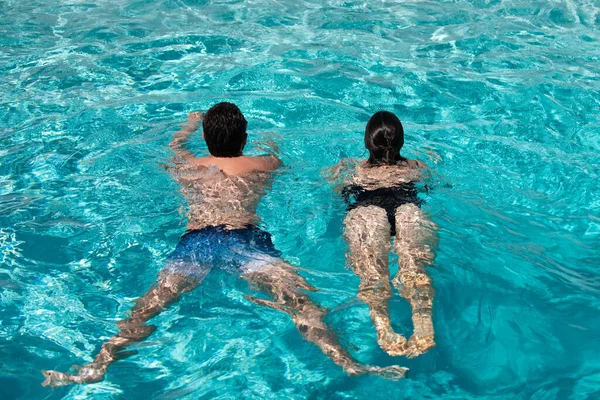 Pool resort. Summertime vacation. Life winner. Butt in bikini. Sexy couple in pool. — 스톡 사진