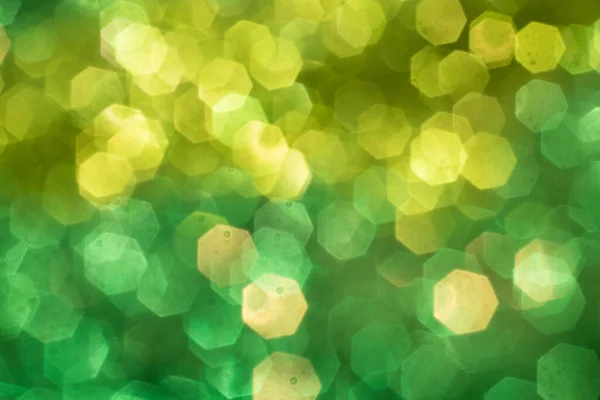 Abstrakt grön bokeh. Helgdagar bakgrund. Ljusa färgstarka bakgrund. — Stockfoto