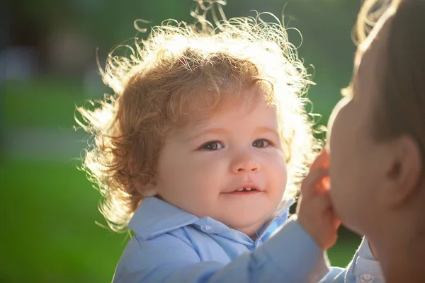 Baby child and mother on sunny day. Kids face, little boy portrait. Childhood and parenting concept. — Stock Photo, Image