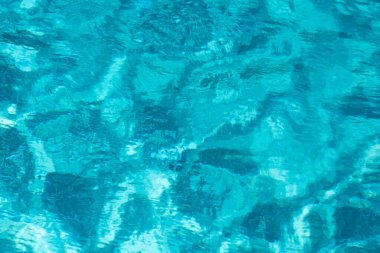 Tansken 'in sakin su yüzeyi dokusu. Soyut doğa geçmişi. Deniz suyu deseni.