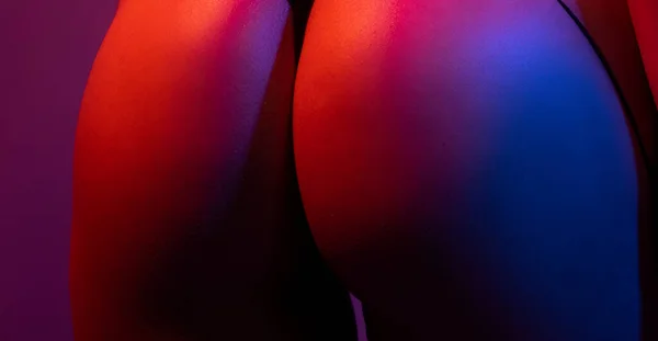 Sexy seductive lady in beautiful lingerie. Erotic girl fashion. Perfect sexy butt close up. Ideal womans butt and hips. Perfect anti-cellulite buttocks. Sexy butt with sensual touch on lights. — Stockfoto