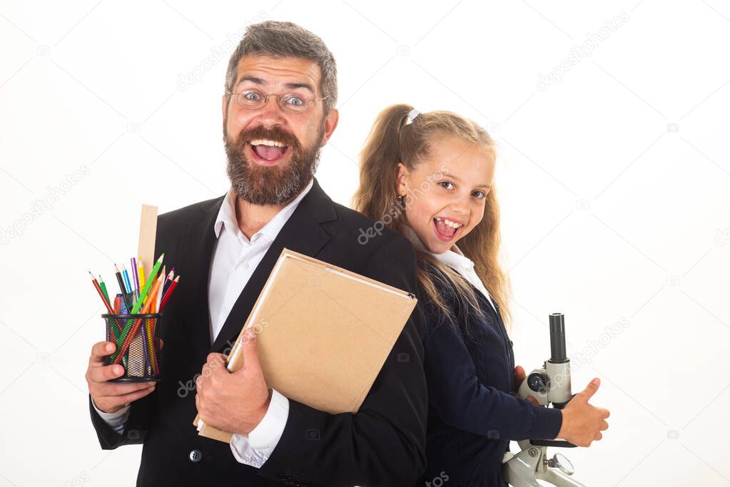 Portrait of happy smiling pupil schoolgirl and tutor with school supplies. Funny teacher isolated on white background. Back to school.