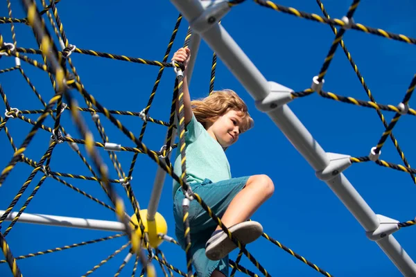 Boy playing in the playground. Kids play outdoor. Rope Park. — Stock Photo, Image