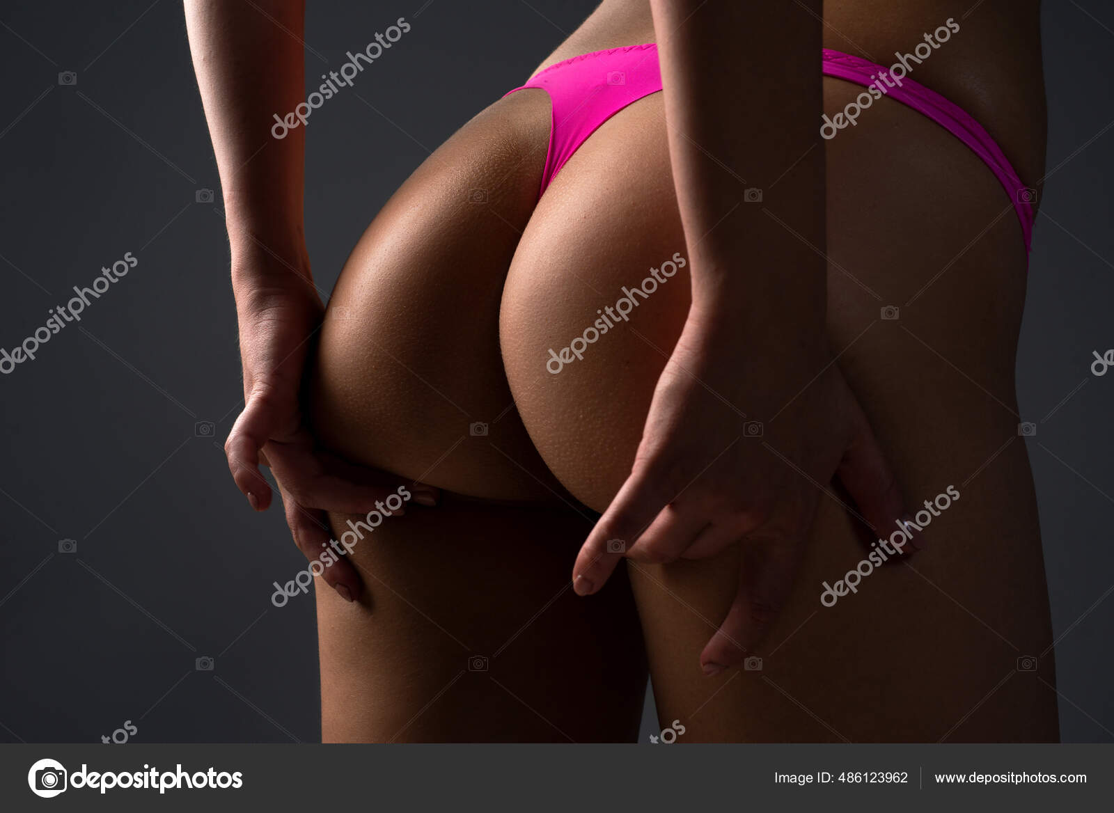 Sexy female ass in panties. Sexy curves girl butt without cellulite. Beautiful slim body. Luxury ass. Huge buttocks, night club background pic