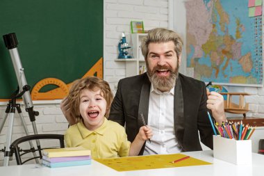 Home school for pupil. School kids. Elementary school classroom. Little ready to study. Early development.