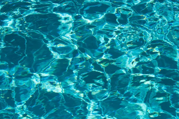 Pool vatten bakgrund, blå våg abstrakt eller krusade vatten konsistens bakgrund. — Stockfoto