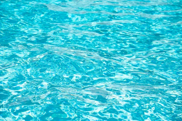 Water in swimming pool, background with high resolution. Wave abstract or rippled water texture. — Stock Photo, Image