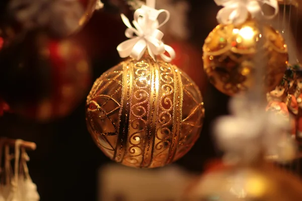 Christmas tree decoration on golden — Stock Photo, Image