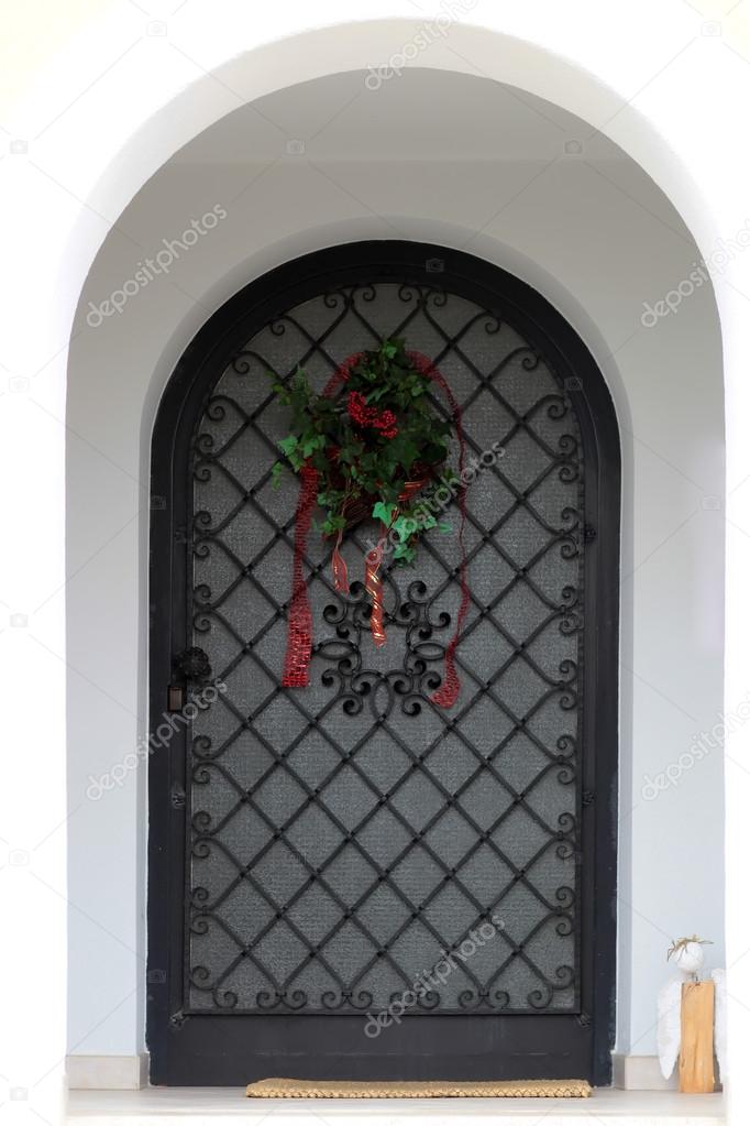 Iron doors  with wreath