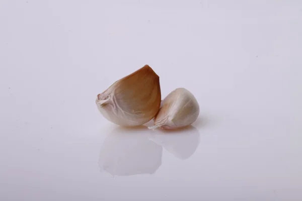 Garlic clove on grey — Stock Photo, Image