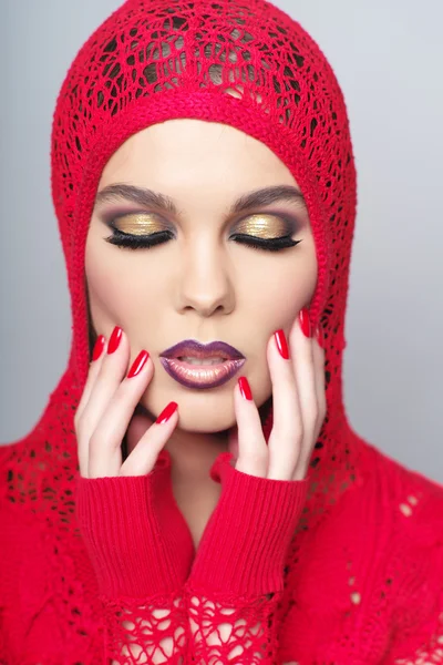 Portrait of beautiful woman wearing red clothes — Stock Photo, Image