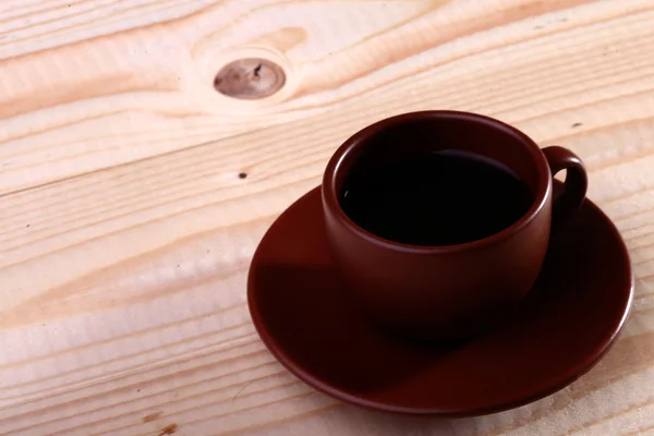 Koffiekopje op tafel — Stockfoto