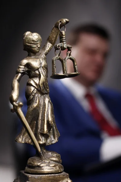 Femida statue and lawyer — Stock Photo, Image