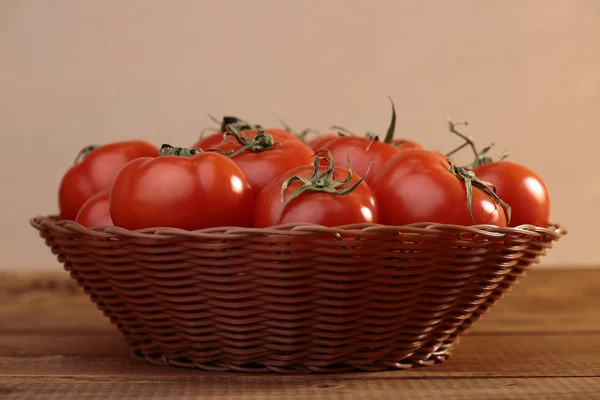 Ripe tomatoes in basket — Stock Photo, Image