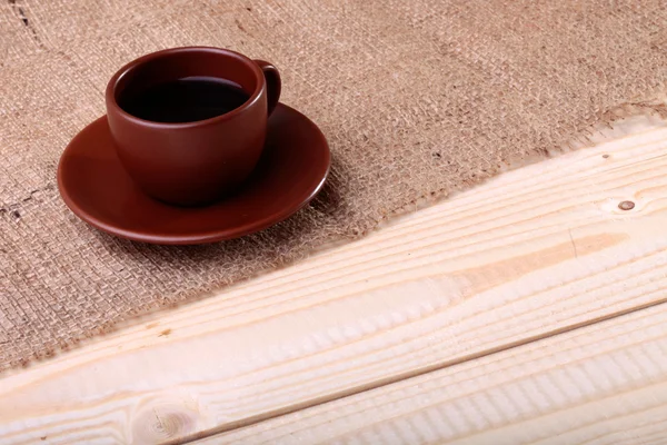 Koffiekopje op tafel — Stockfoto