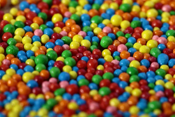 Colored small sweets background — Stock Photo, Image