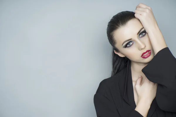 Striking woman in shirt — Stock Photo, Image