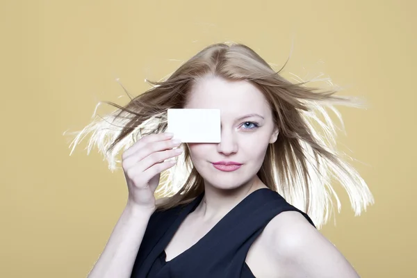 Girl with blank business card — Stock Photo, Image