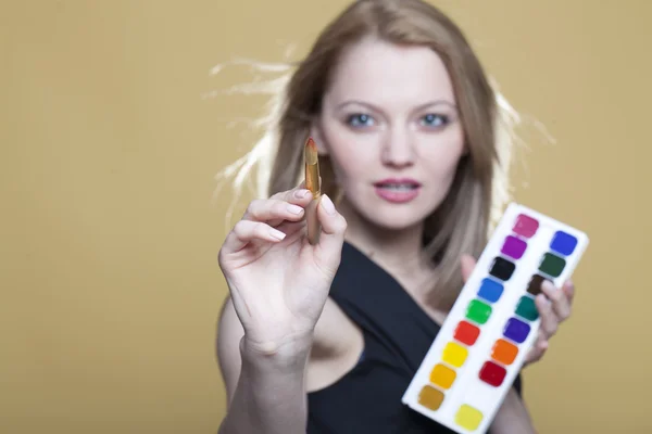 Woman with paint and brush — Stock Photo, Image